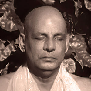 Swami Sivananda meditating in the forest jungle