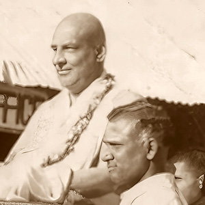 Disciples and devotees carry the master through the streets during Sivananda's All India Tour. 