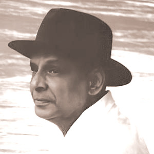 Swami Sivananda wearing a hat in chiller weather
