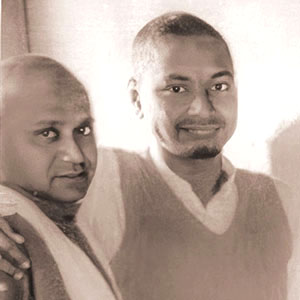 Sivananda allows visitors to perform a padapuga on Swami Sivananda. Disciples Swami Mahdavananda & Swami Venkatesananda observe. 