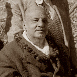 Sivananda and others move through the ashram. 